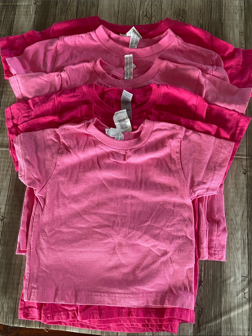 ASSORTMENT OF LIGHT PINK AND DARK PINK TODDLER TEES—LOT OF 6